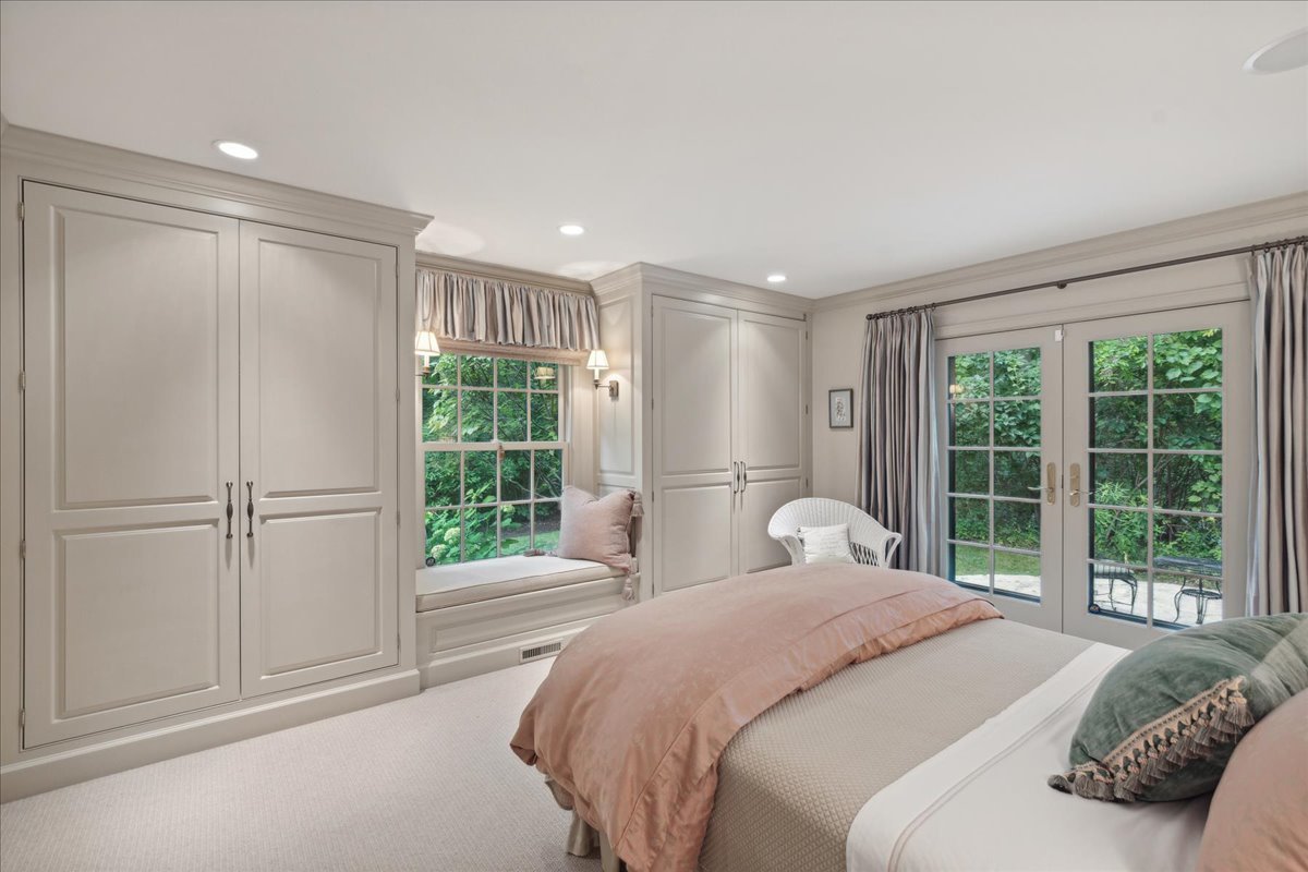1213 Turicum Road Lake Forest, IL 60045 - Photo 33 of 59 a bedroom with a bed and a window