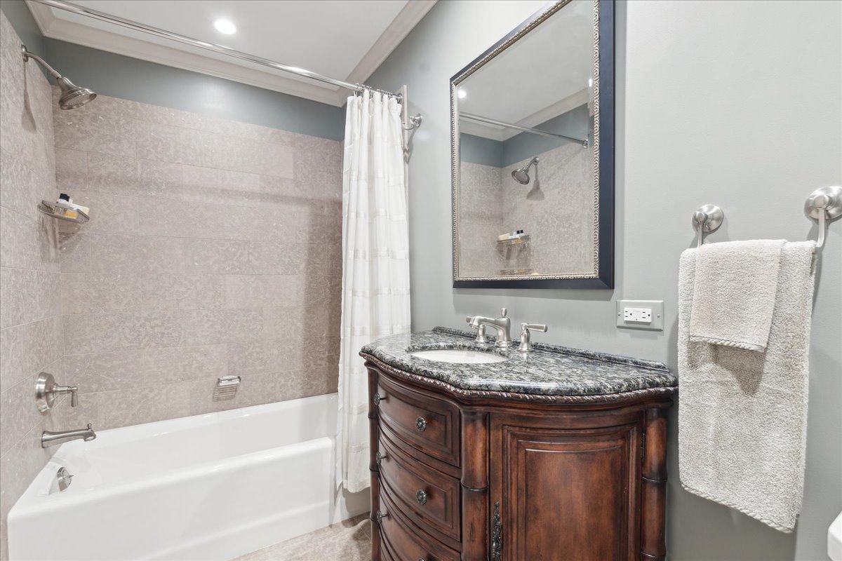 1213 Turicum Road Lake Forest, IL 60045 - Photo 38 of 59 a bathroom with a granite countertop sink and a mirror