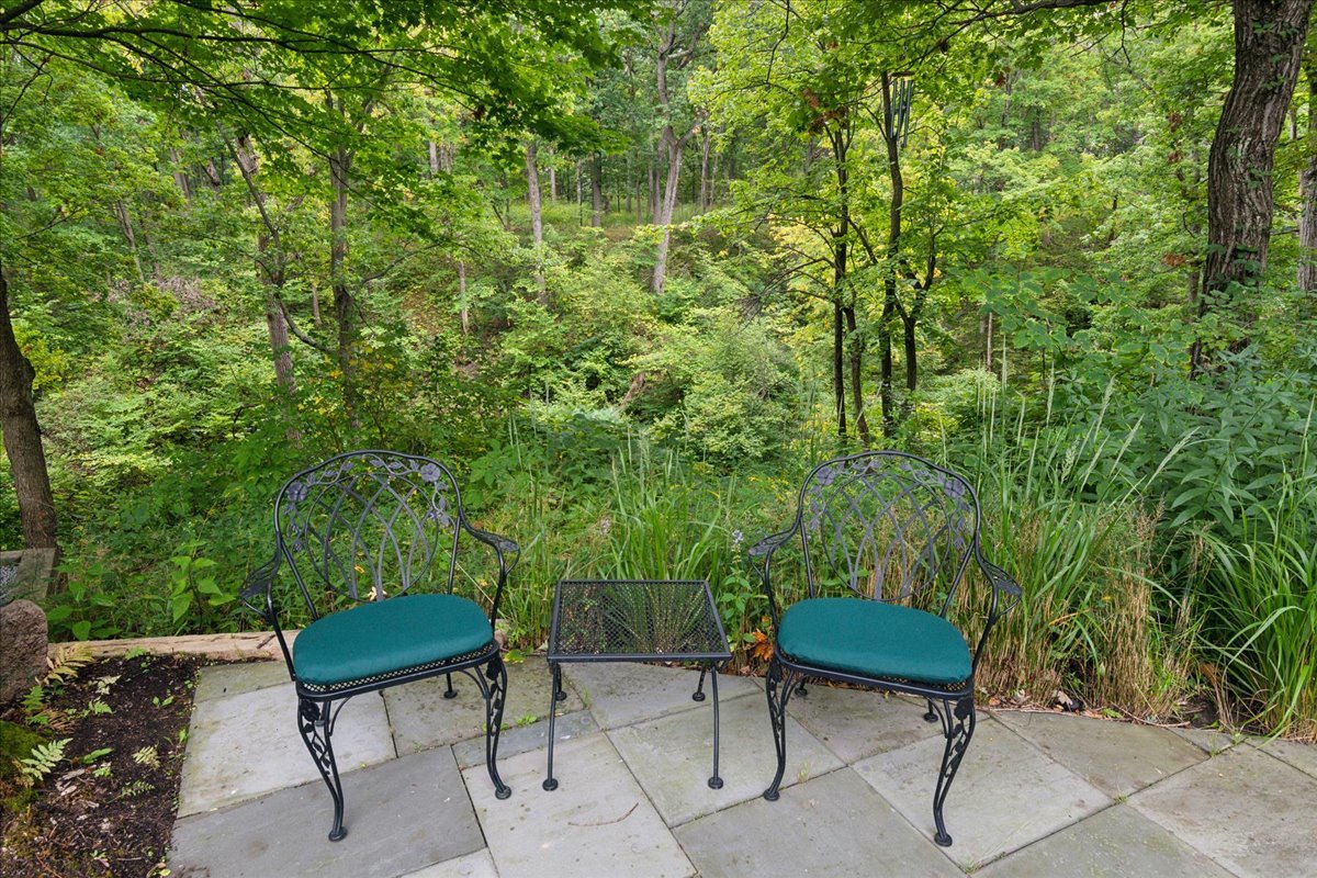 1213 Turicum Road Lake Forest, IL 60045 - Photo 48 of 59 a view of chair and table in the backyard