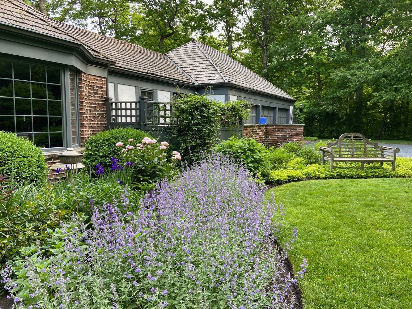 1213 Turicum Road Lake Forest, IL 60045 - Photo 56 of 59 a view of a house with a yard and garden