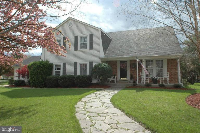 4312 Cub Run Road Chantilly, VA 20151 - Photo 1 of 1 a front view of a house with a yard and garage