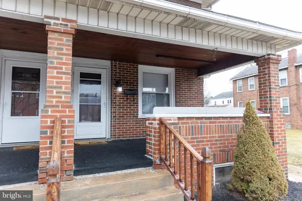 a white refrigerator freezer sitting inside of a kitchen