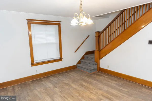 a view of workspace with wooden floor