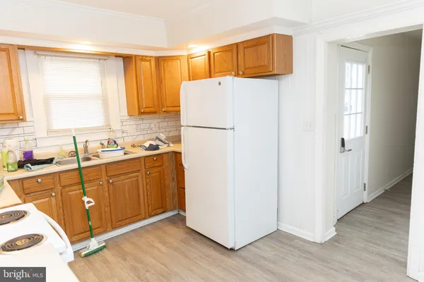 a bathroom with a sink a mirror and a shower