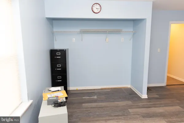 a view of an empty room and window