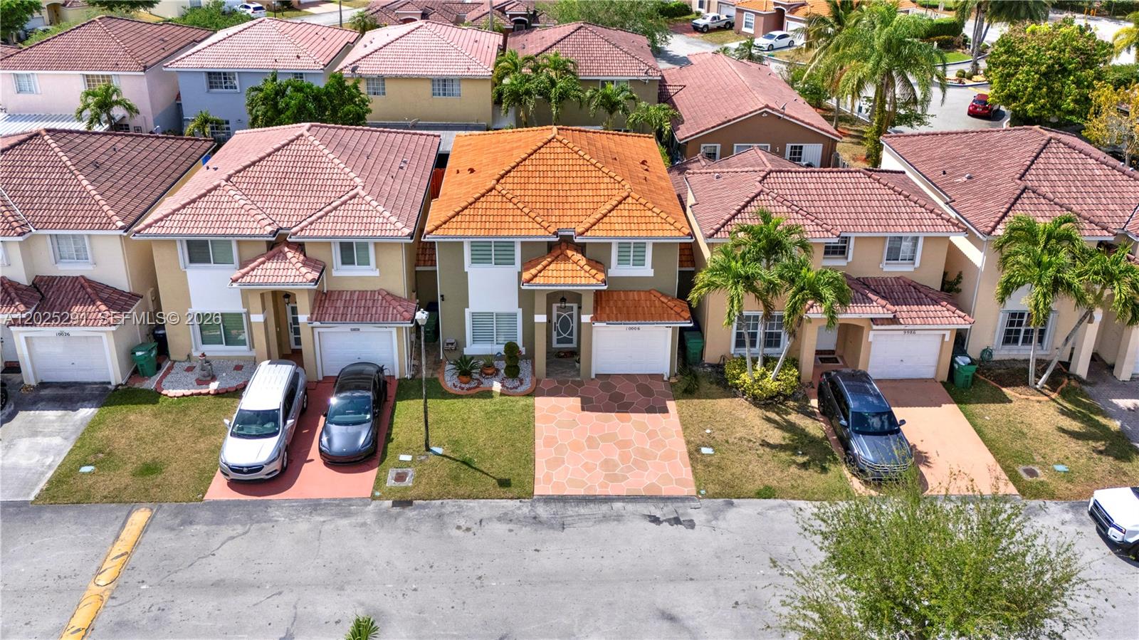 10006 Southwest 162nd Path Miami, FL 33196 - Photo 5 of 40 an aerial view of a house