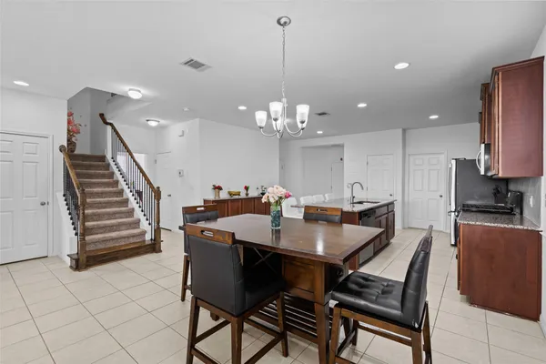 a view of a dining room with furniture
