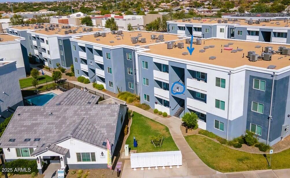 12945 West Greenway Road, Unit 36 El Mirage, AZ 85335 - Photo 2 of 10 Village on Greenway exterior Building E