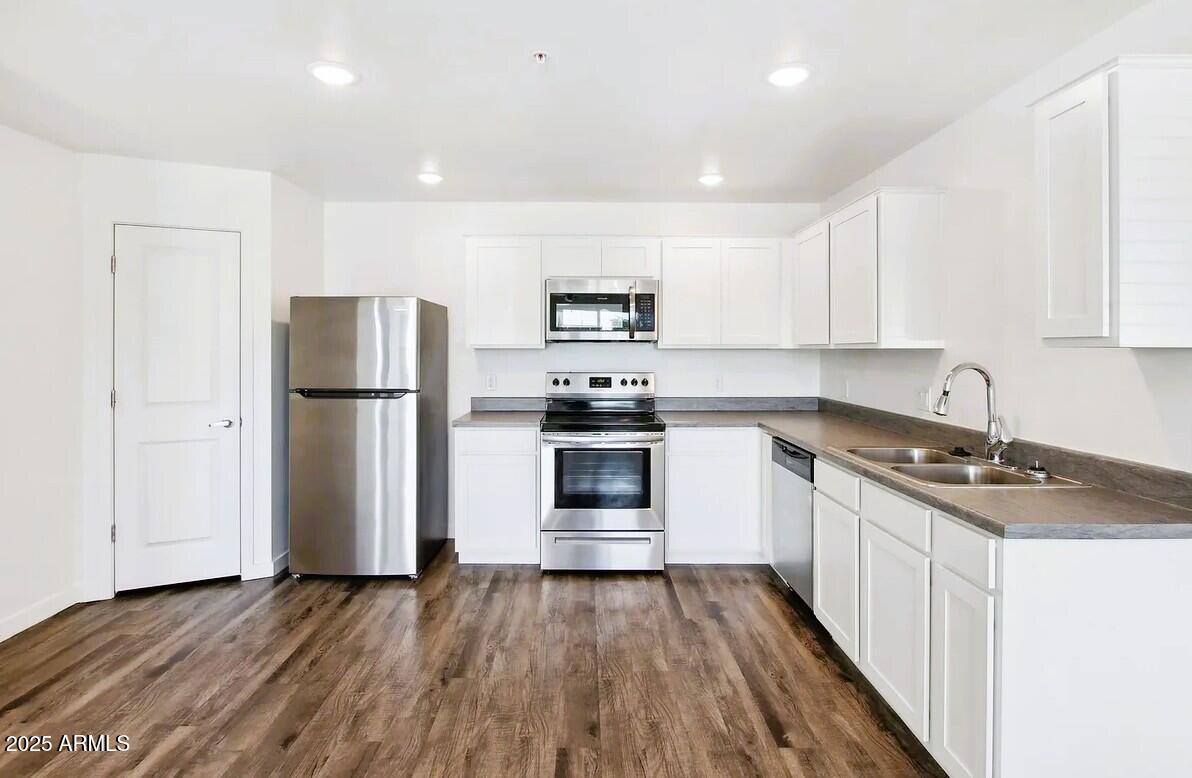 12945 West Greenway Road, Unit 36 El Mirage, AZ 85335 - Photo 3 of 10 Kitchen with pantry - 36 Bld E