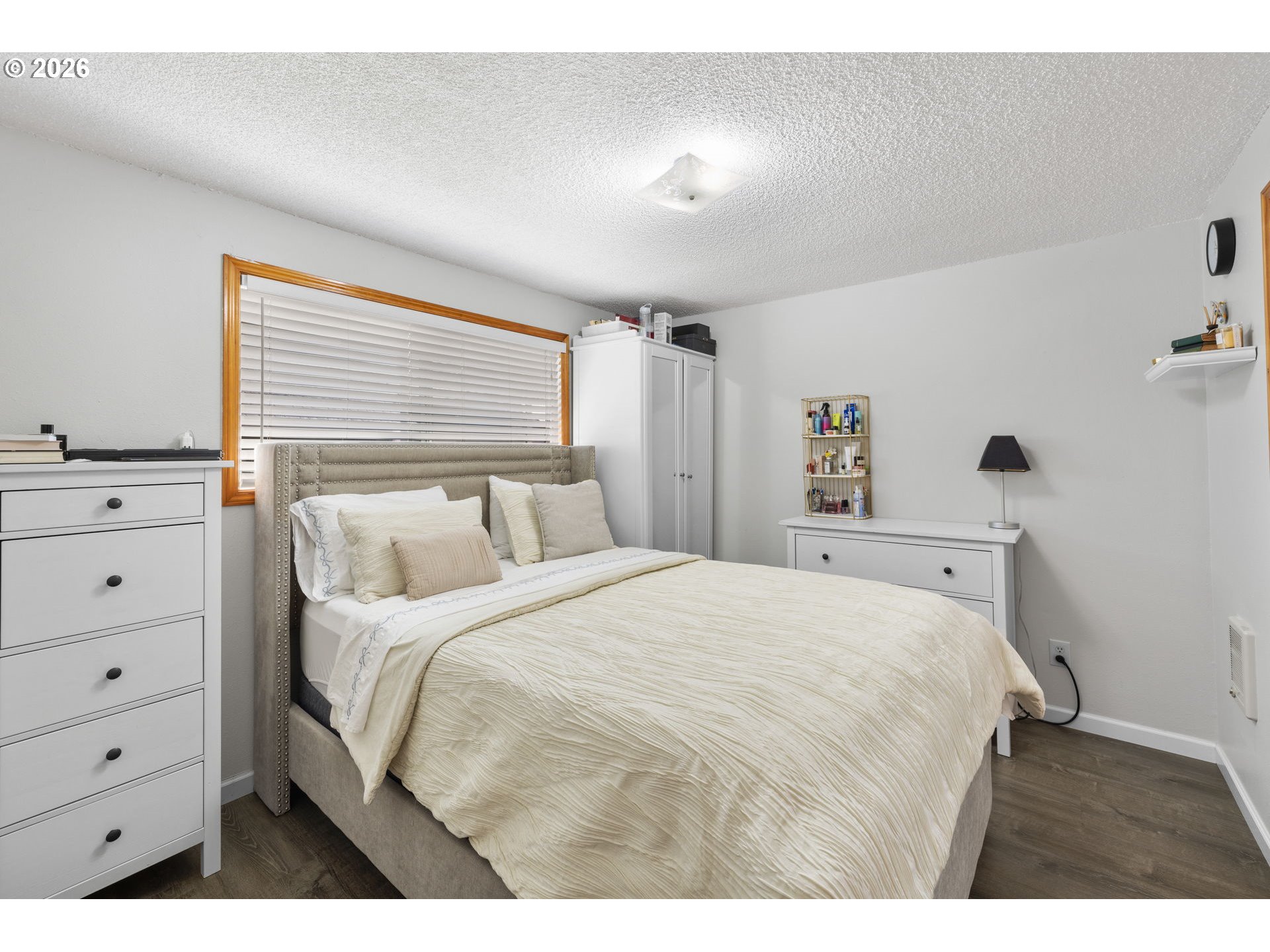 1480 Northeast Kane Drive Gresham, OR 97030 - Photo 12 of 46 a bedroom with a bed and a dresser