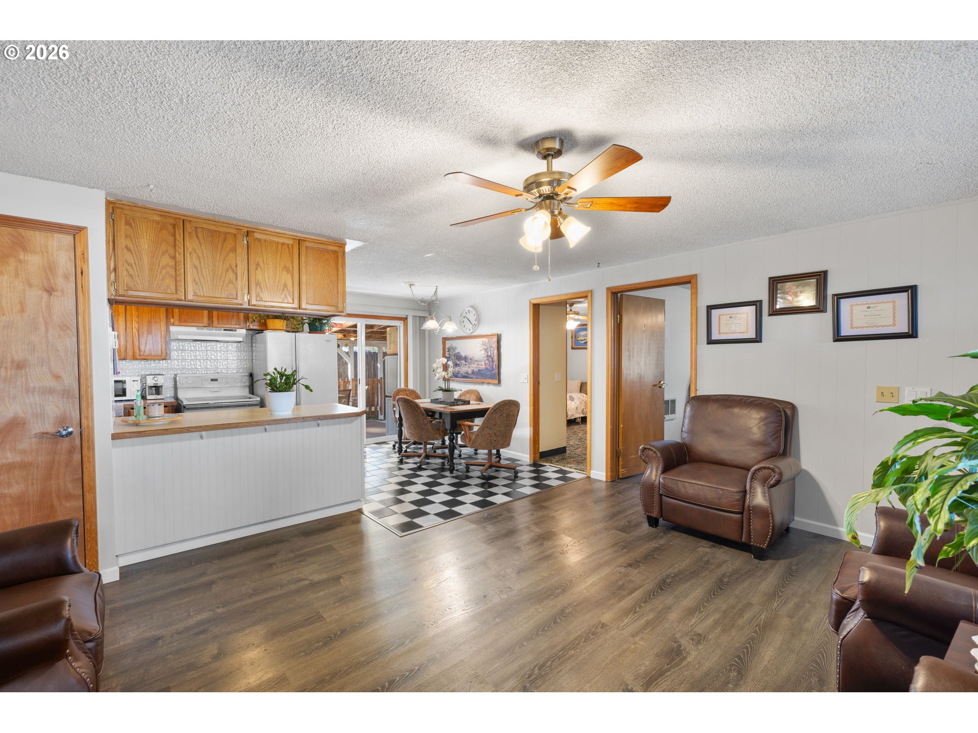 1480 Northeast Kane Drive Gresham, OR 97030 - Photo 18 of 46 a living room with furniture and wooden floor