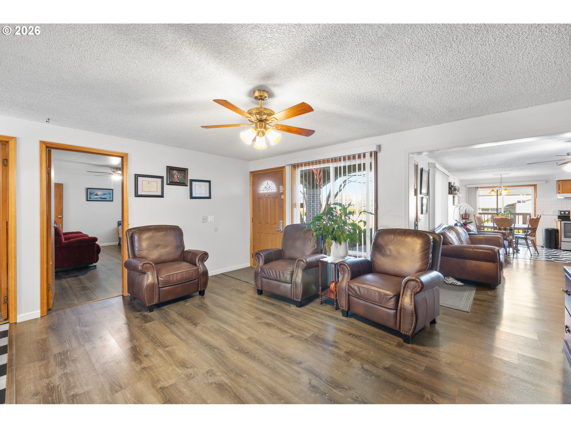 1480 Northeast Kane Drive Gresham, OR 97030 - Photo 20 of 46 a living room with furniture and a wooden floor
