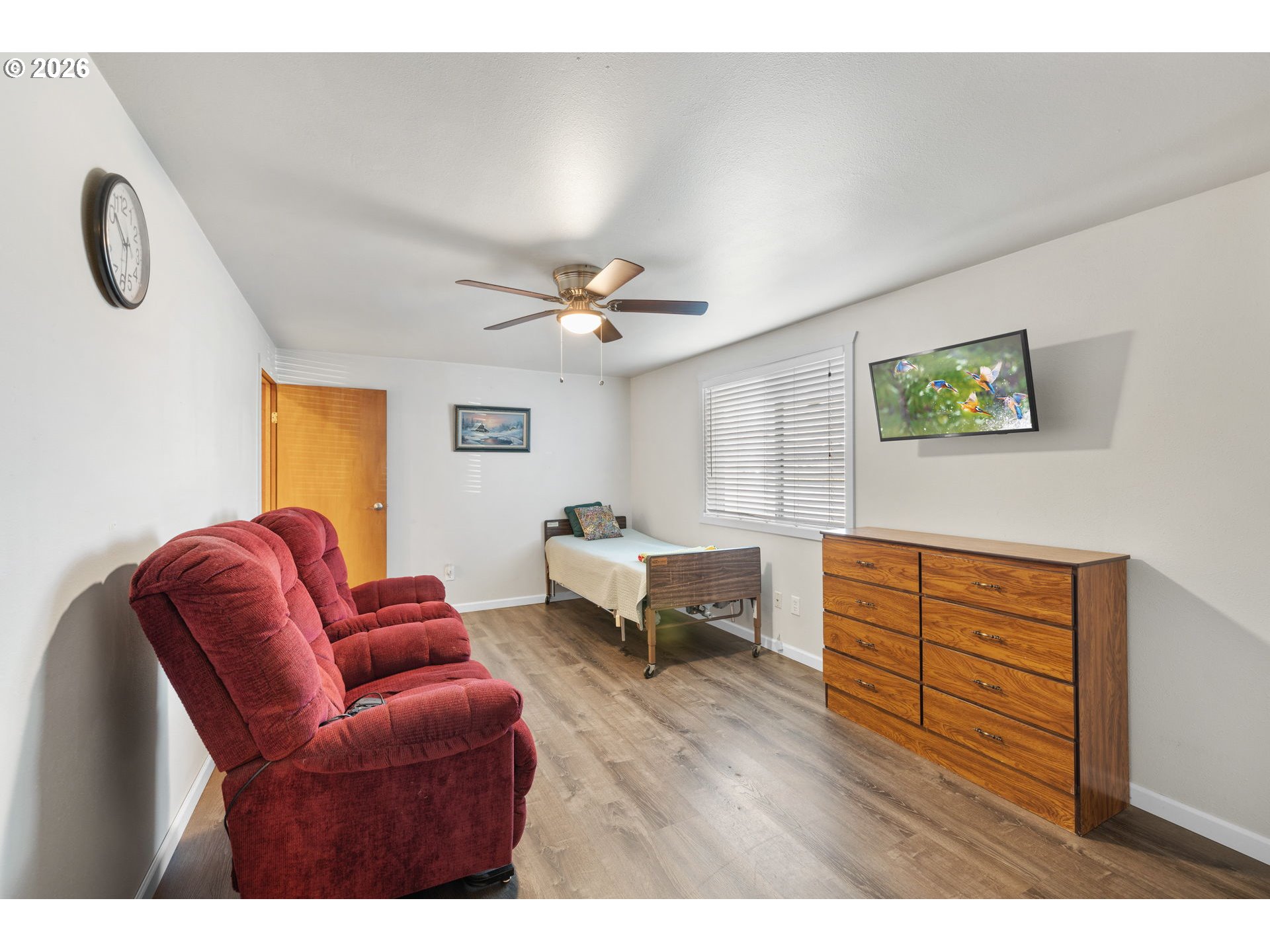 1480 Northeast Kane Drive Gresham, OR 97030 - Photo 27 of 46 a living room with furniture and wooden floor