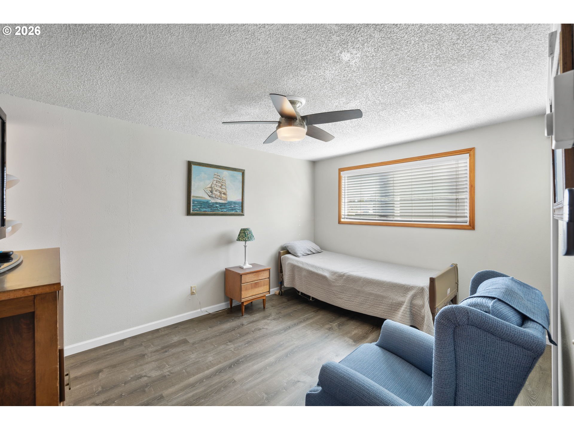 1480 Northeast Kane Drive Gresham, OR 97030 - Photo 39 of 46 a living room with furniture and a window