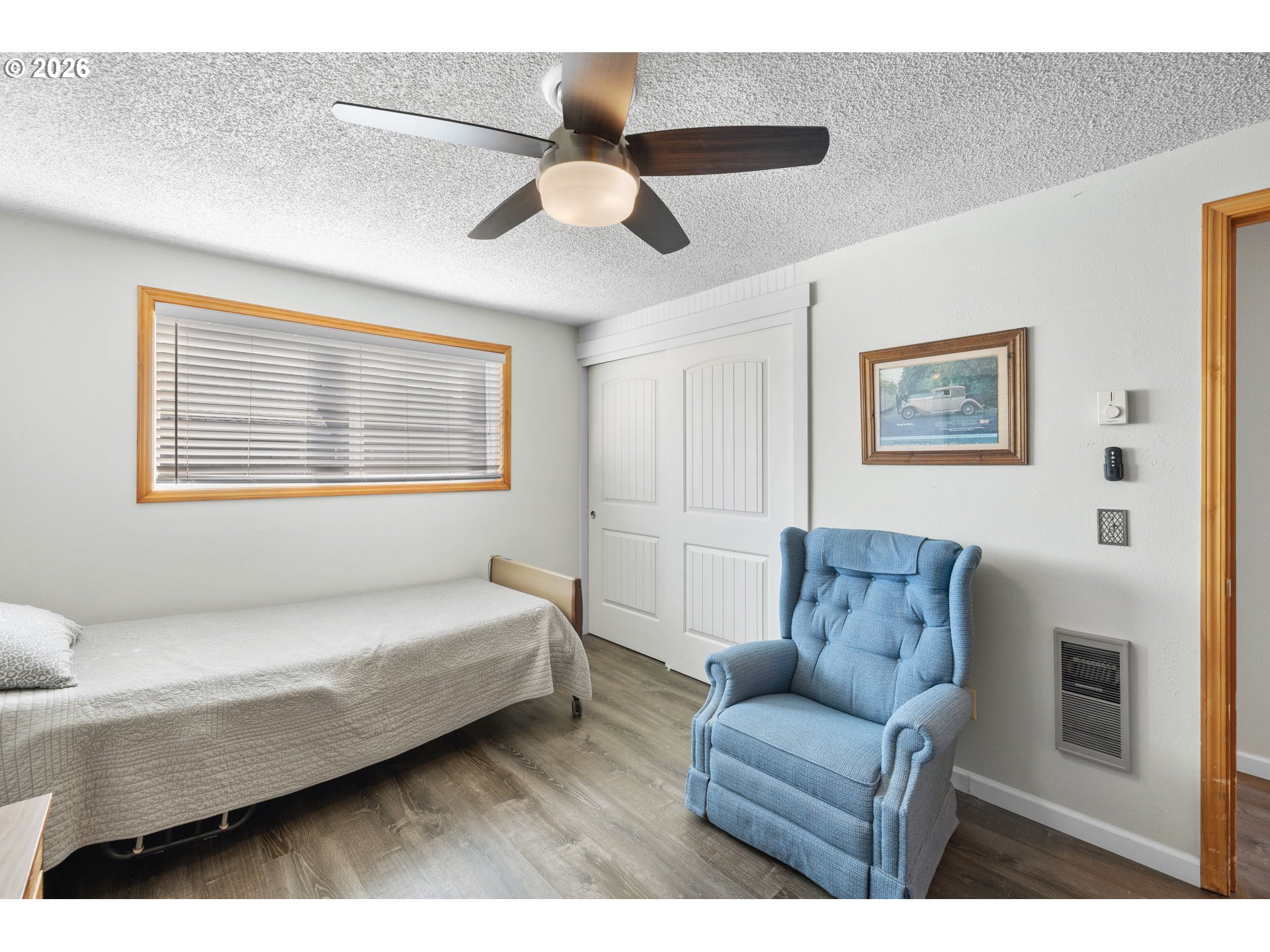 1480 Northeast Kane Drive Gresham, OR 97030 - Photo 40 of 46 a bedroom with a bed couch and window