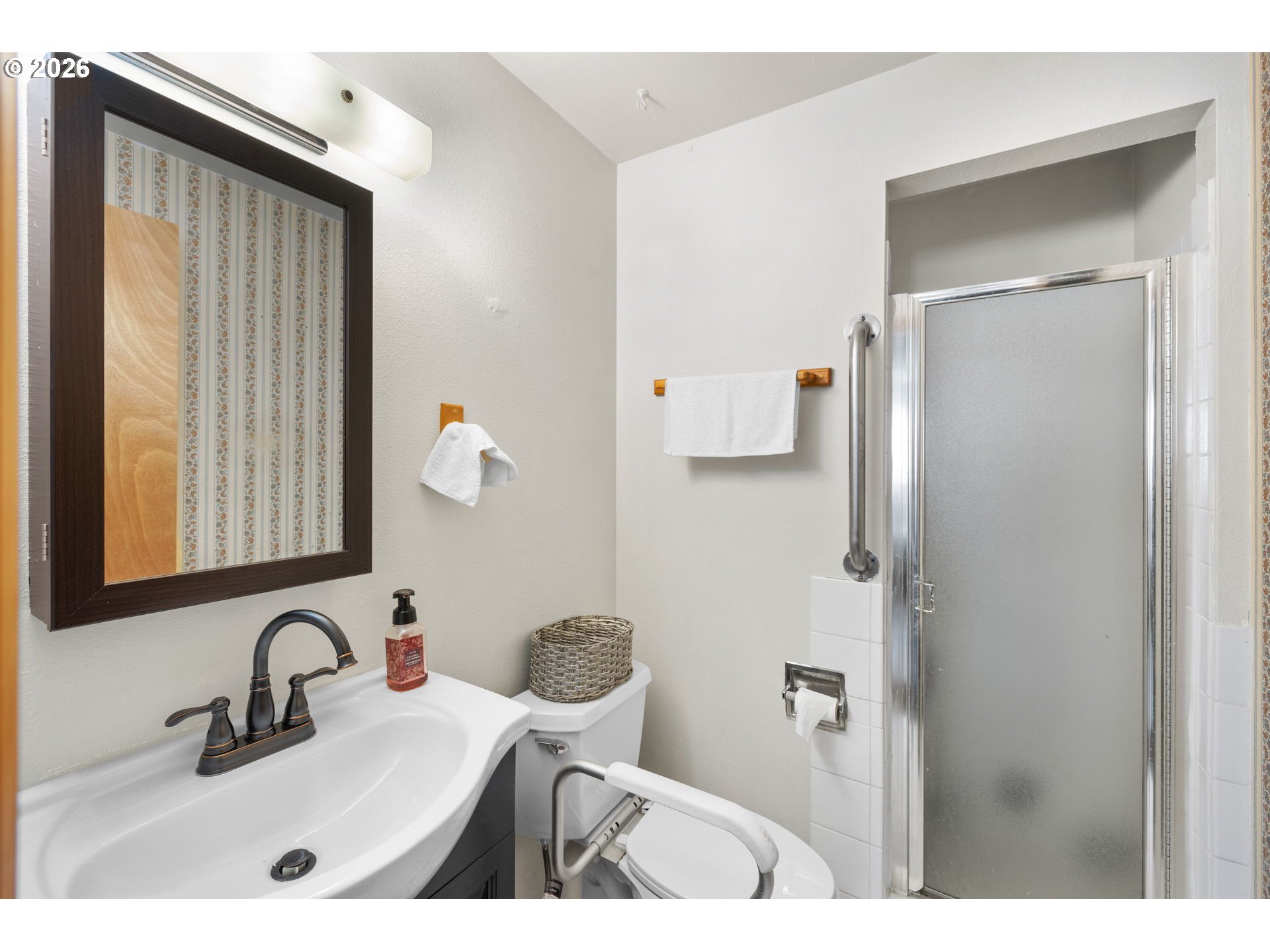 1480 Northeast Kane Drive Gresham, OR 97030 - Photo 41 of 46 a bathroom with a sink vanity and mirror