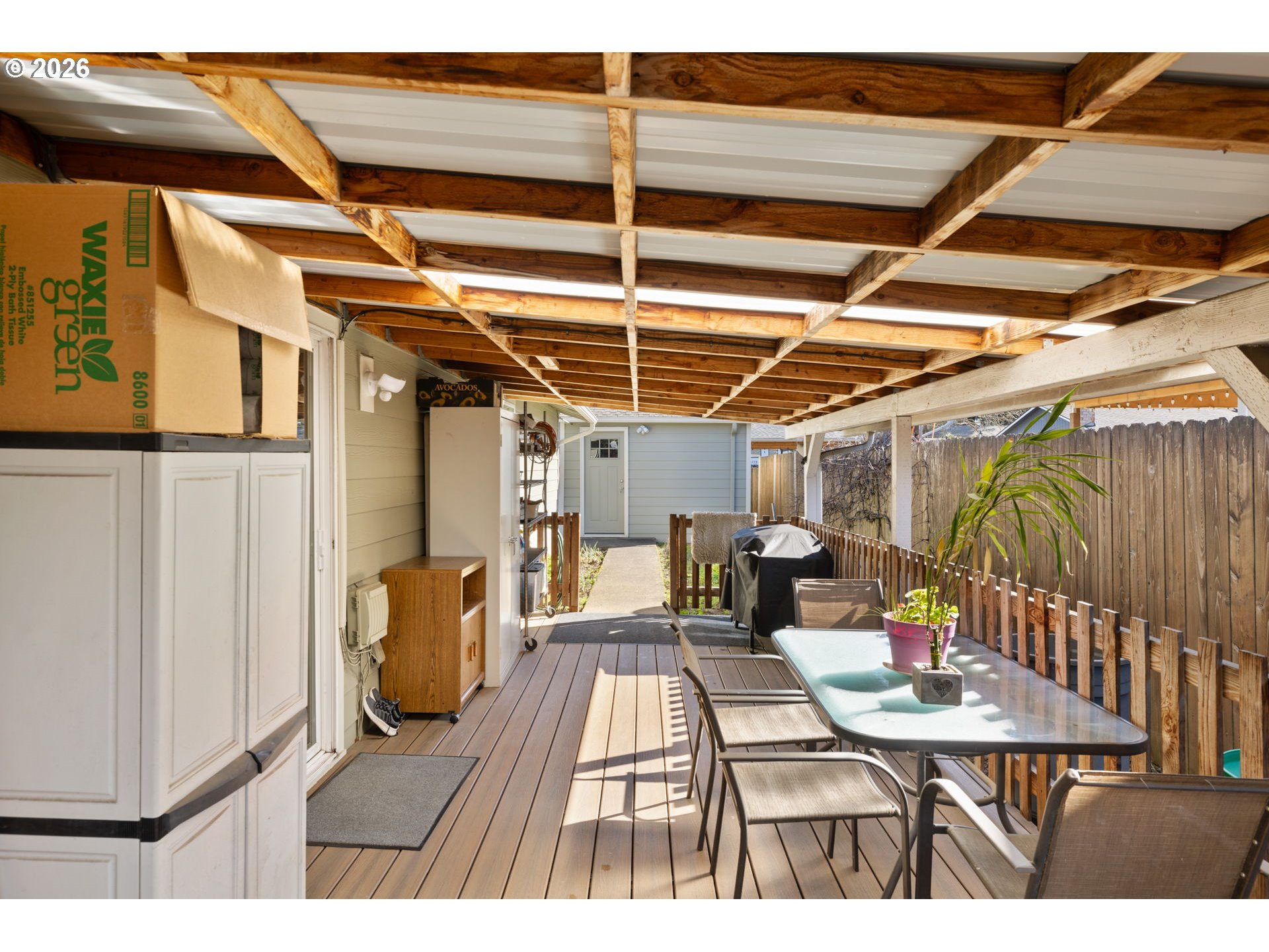 1480 Northeast Kane Drive Gresham, OR 97030 - Photo 42 of 46 a view of a patio with table and chairs with wooden floor