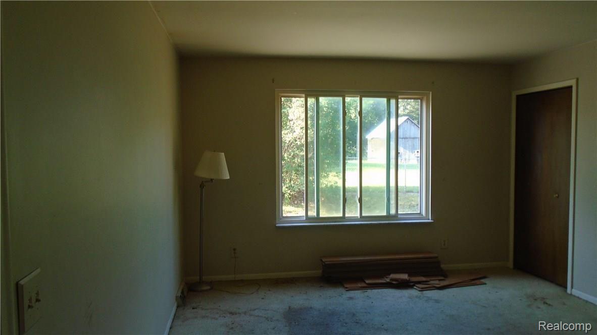 2659 Benstein Road, Unit 7 Commerce Township, MI 48382 - Photo 10 of 20 Living room with Wallside window 2009