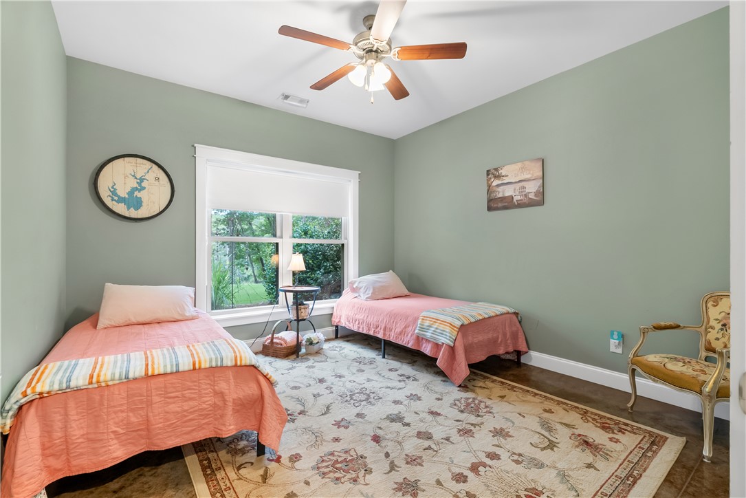 329 High Hampton Road Salem, SC 29676 - Photo 35 of 47 Natural light pours through a large window, highlighting the rich hardwood floors.