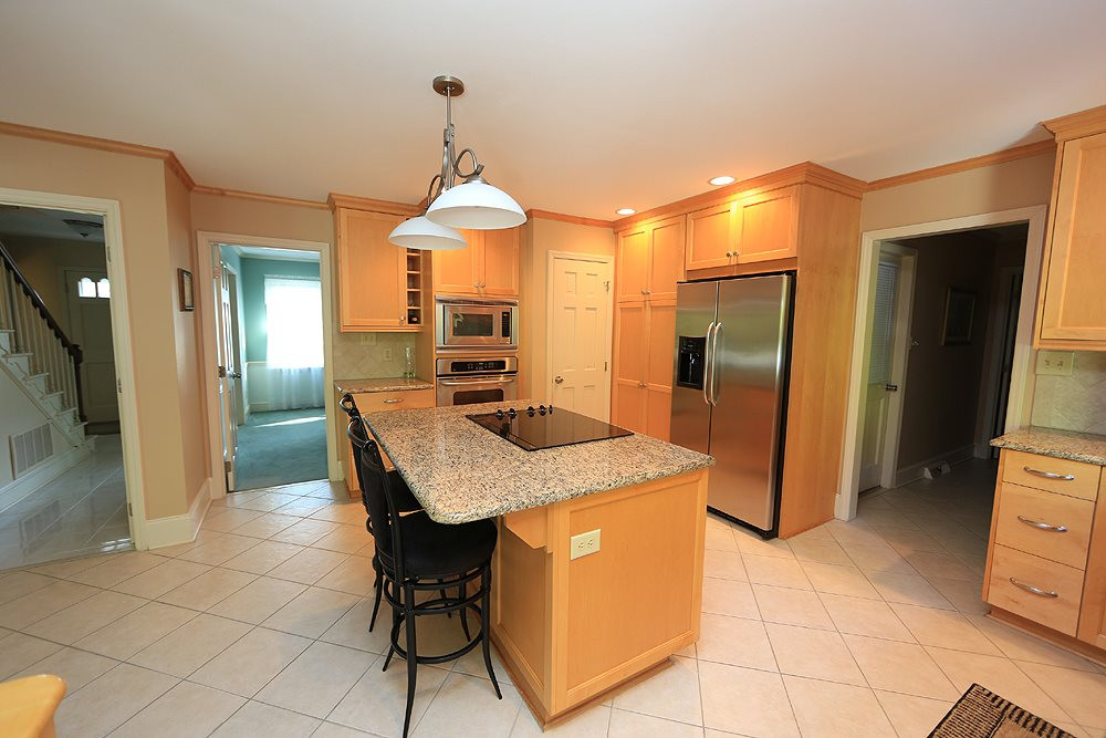 7905 Hardwick Drive Raleigh, NC 27615 - Photo 5 of 26 There is a storage area for vacuum, brooms in addition to the cabinet pantry. Kitchen