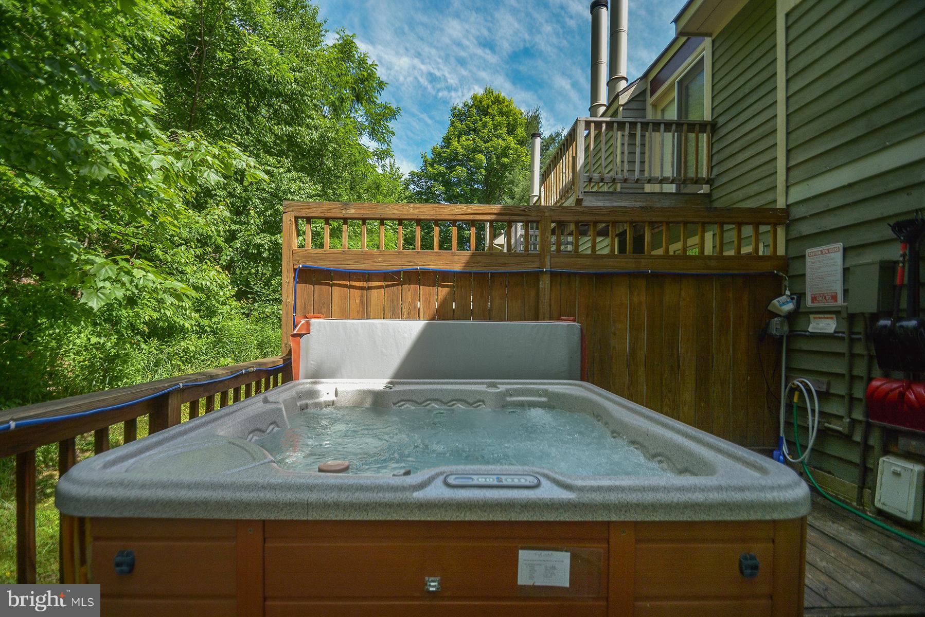 12 Winding Way, Unit 18A McHenry, MD 21541 - Photo 2 of 35 a view of a street with sitting area