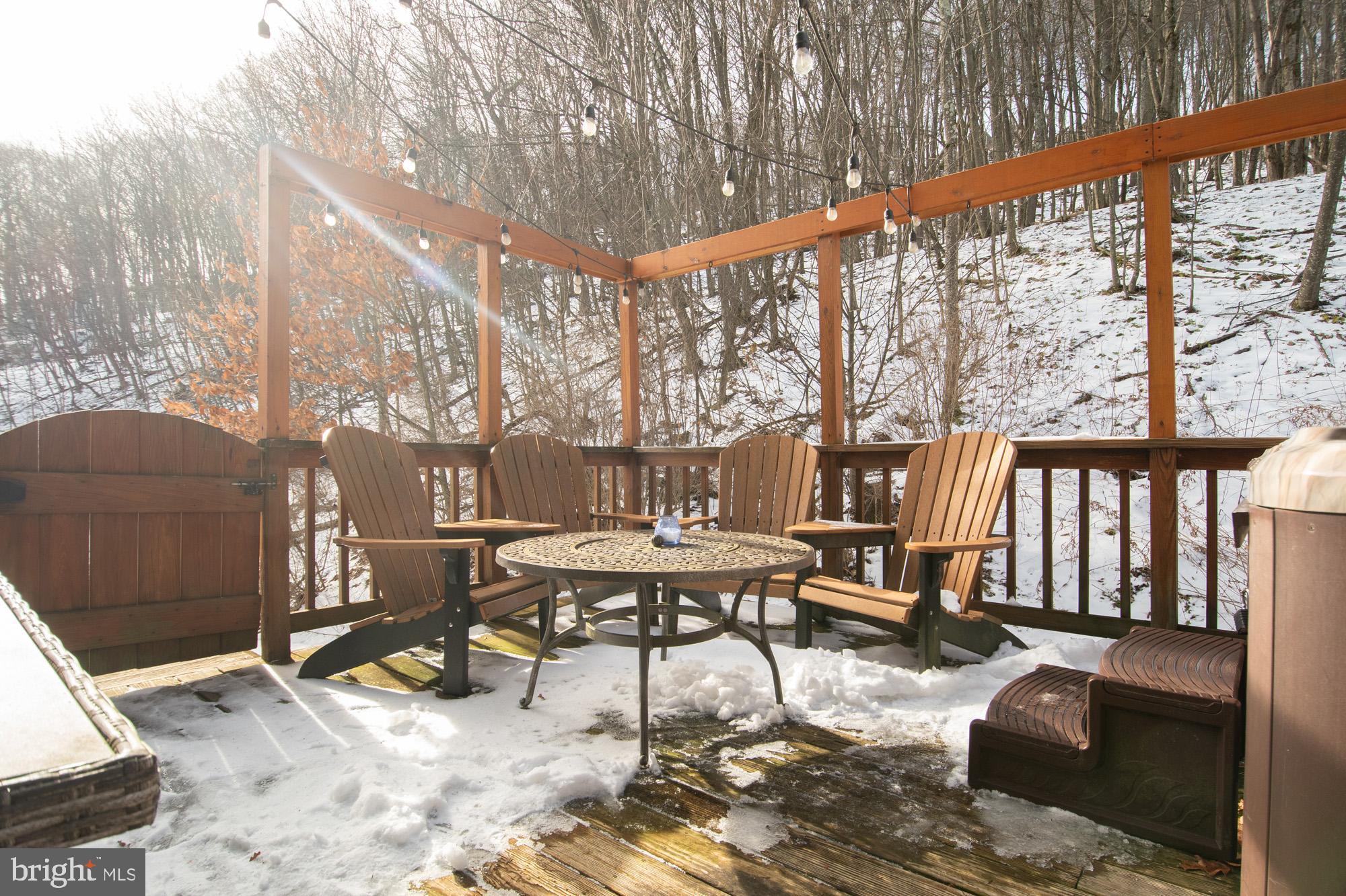 12 Winding Way, Unit 18A McHenry, MD 21541 - Photo 25 of 35 a view of a patio with a yard