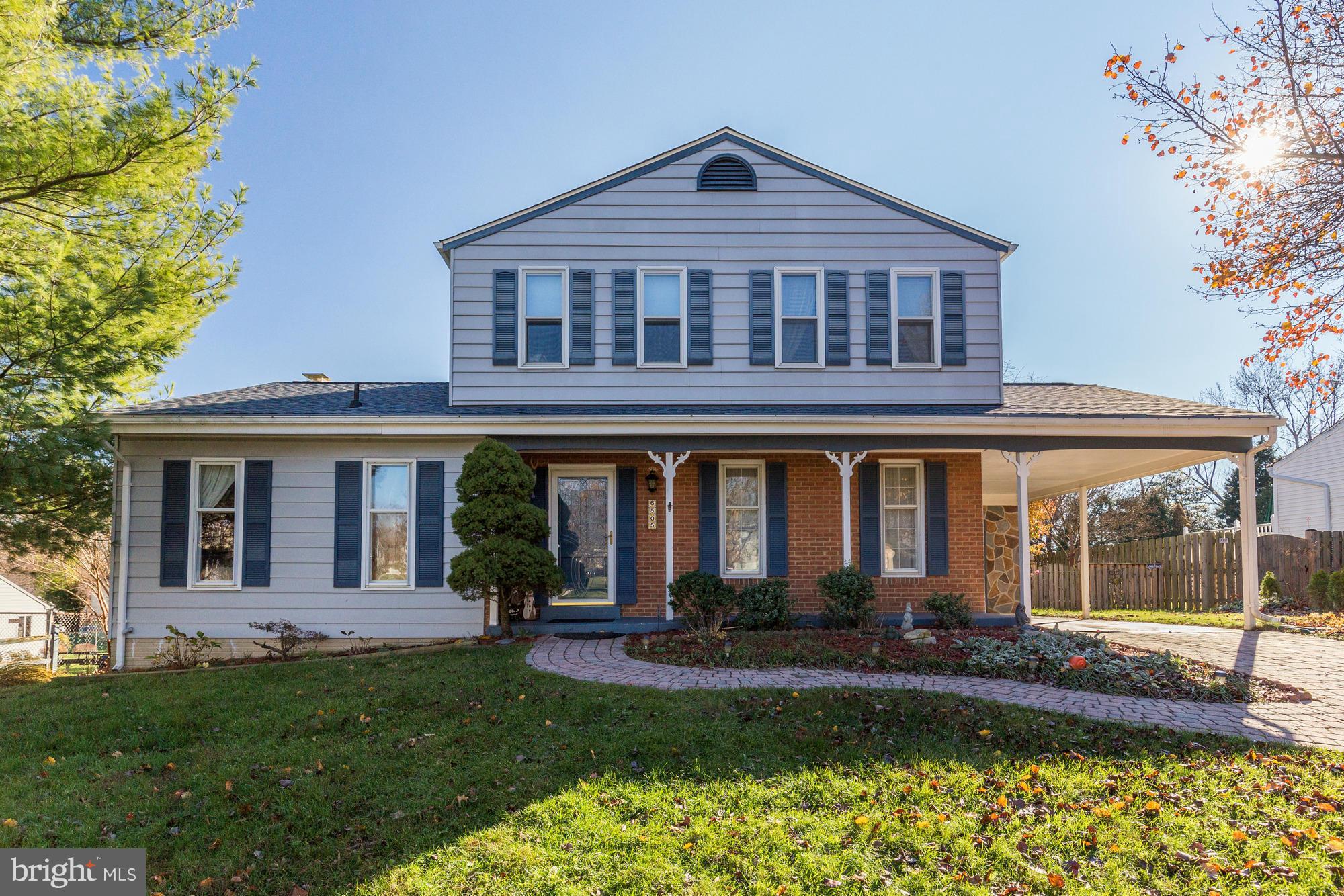 6505 Darwin Road Laurel, MD 20707 - Photo 1 of 30 a front view of a house with a yard