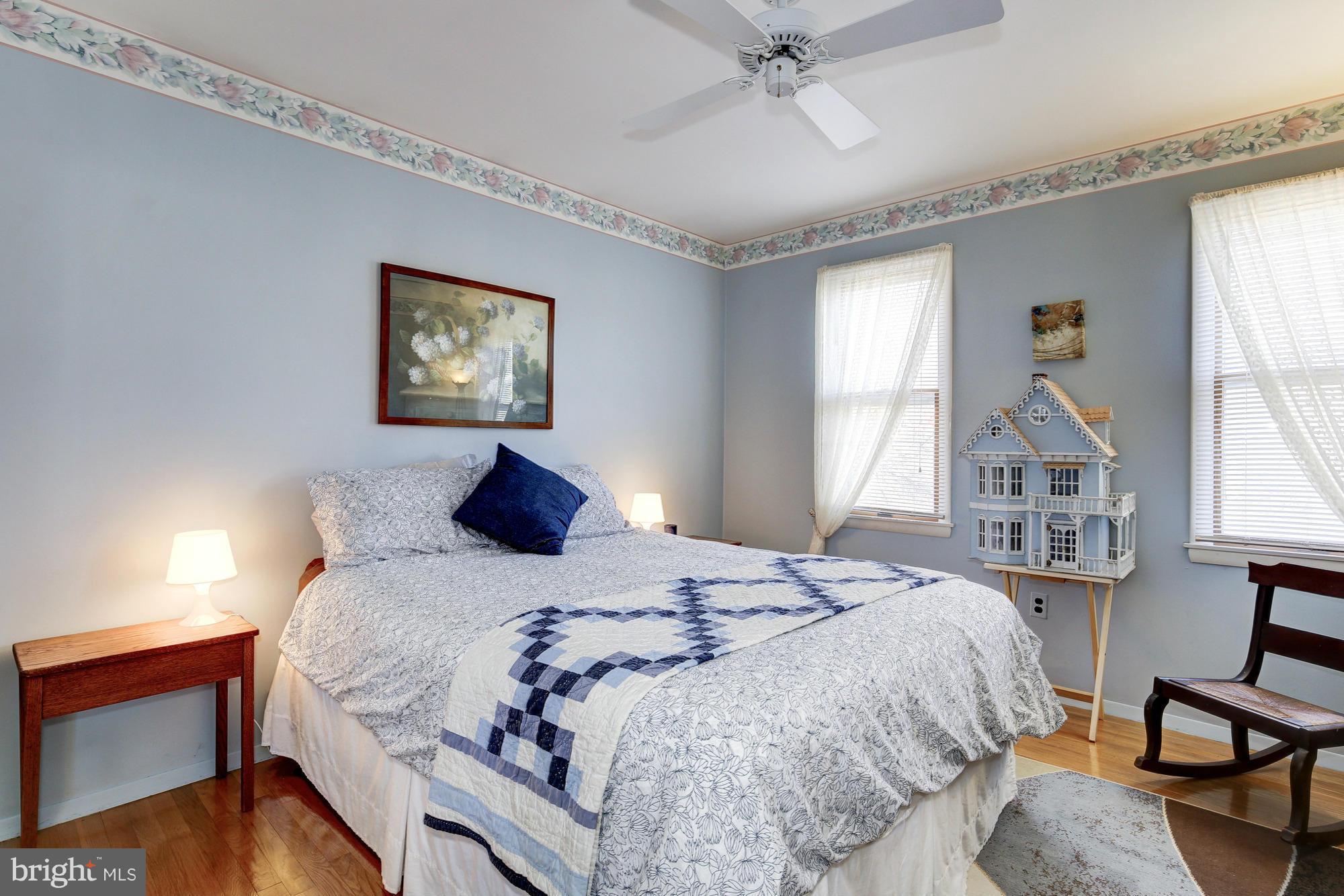 6505 Darwin Road Laurel, MD 20707 - Photo 19 of 30 a bedroom with a large bed and a window