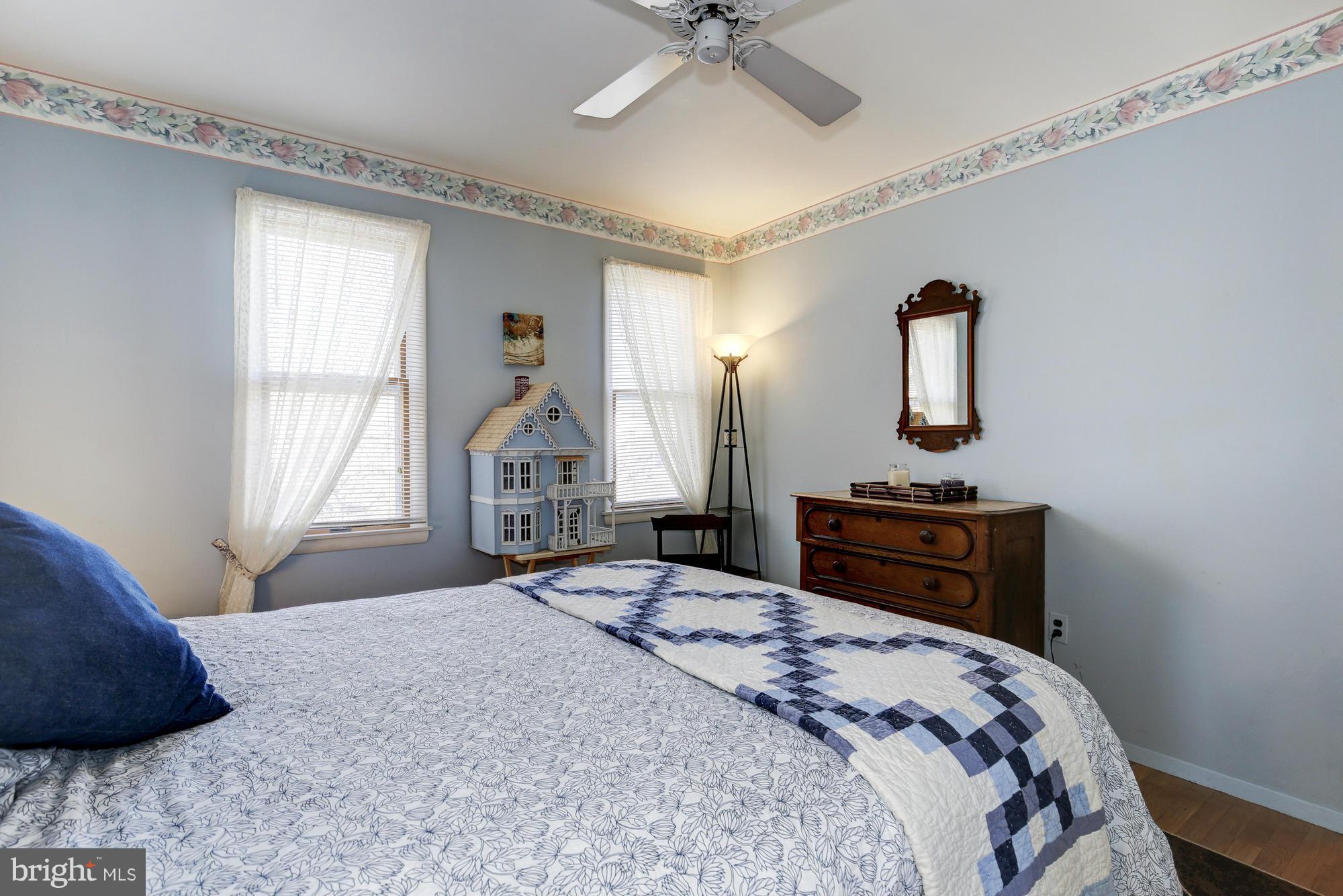 6505 Darwin Road Laurel, MD 20707 - Photo 20 of 30 a bedroom with a bed and a window