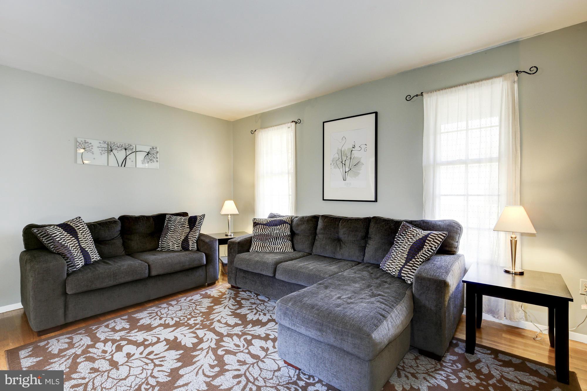 6505 Darwin Road Laurel, MD 20707 - Photo 3 of 30 a living room with furniture and a window