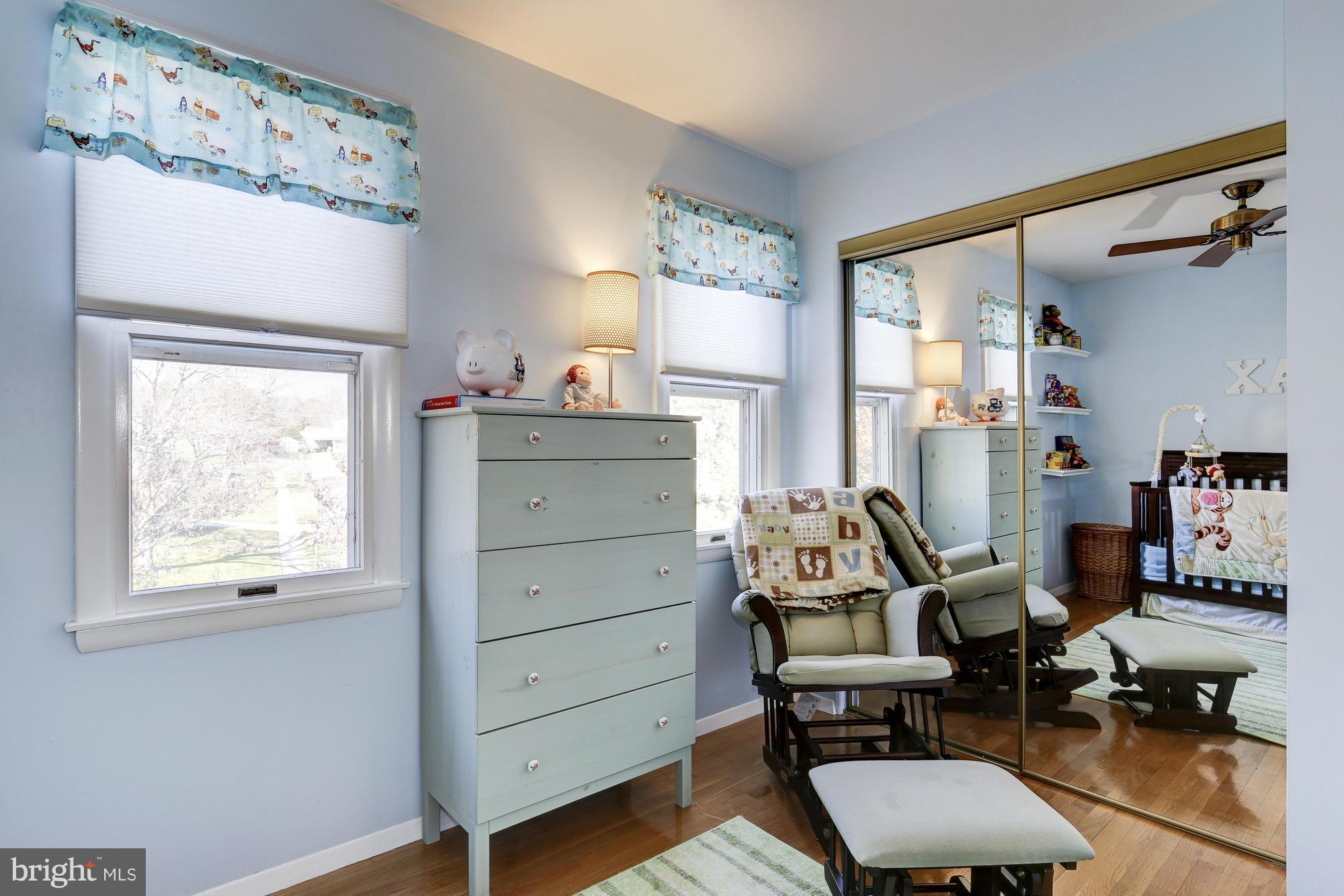 6505 Darwin Road Laurel, MD 20707 - Photo 22 of 30 a view of a workspace with furniture and a window