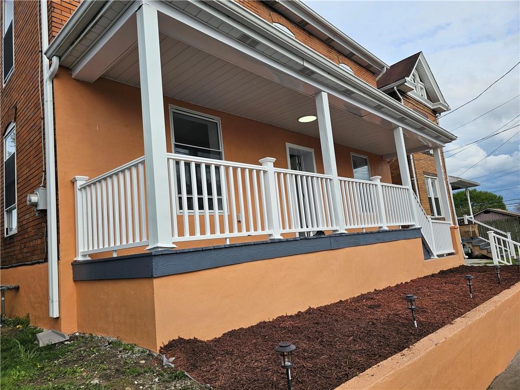 515 Connecticut Avenue Rochester, PA 15074 - Photo 3 of 20 a view of balcony with wooden floor