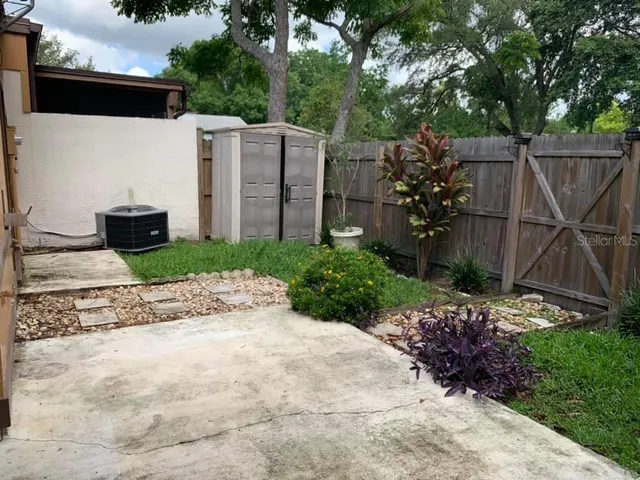 a view of a backyard with plants