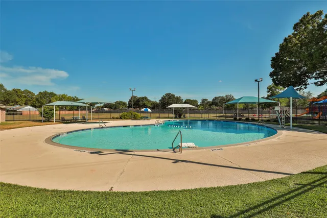 a view of outdoor space yard and swimming pool