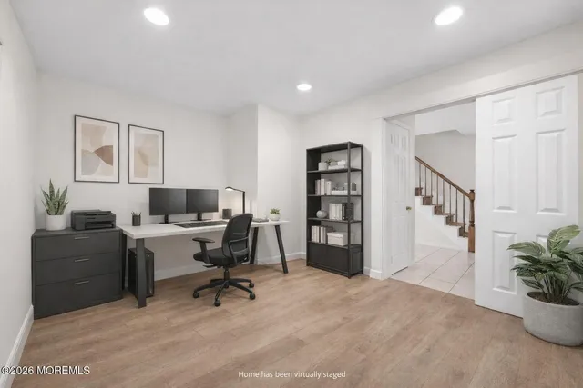 a workspace with furniture and white walls