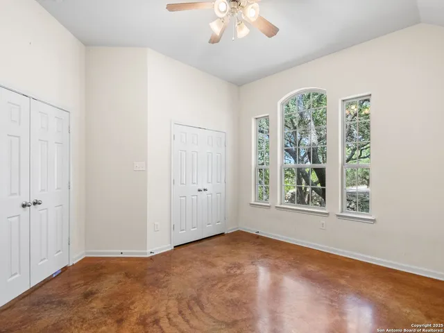 a backyard of a house with lots of green space