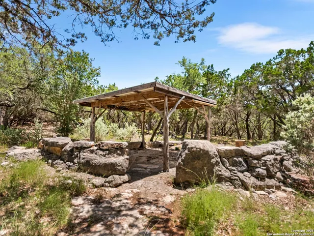 a view of a garage with parked cars