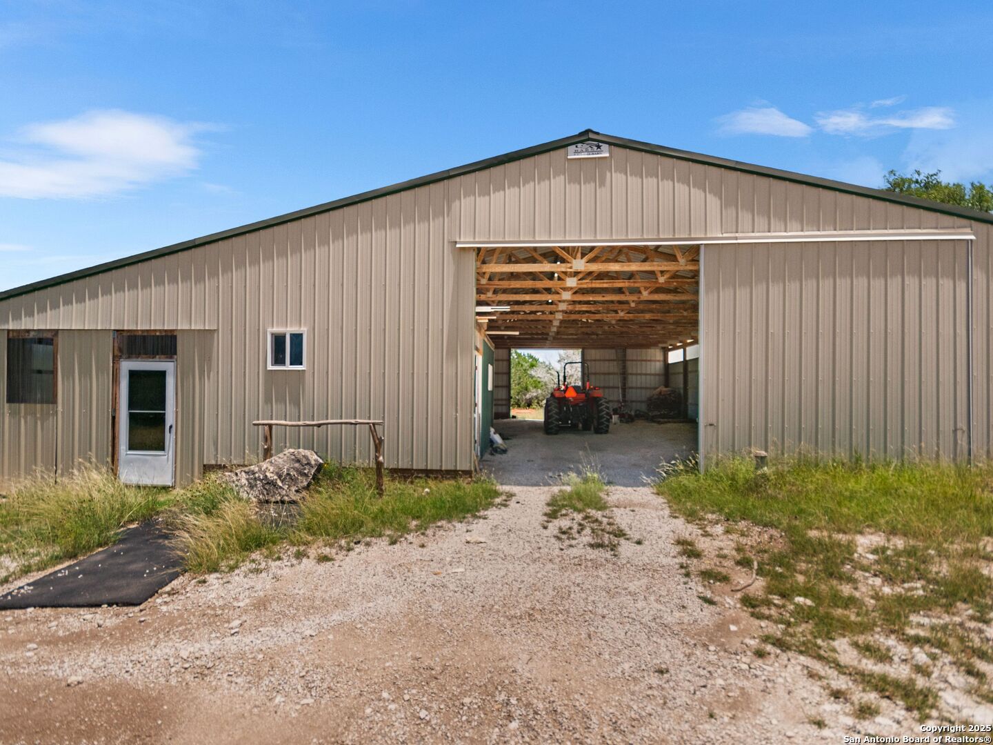 4366 Whartons Dock Road Bandera, TX 78003 - Photo 34 of 80 a front view of a house with a yard