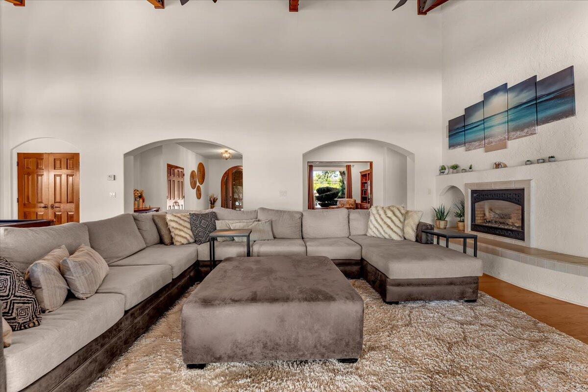 6681 Riverside Drive Redding, CA 96001 - Photo 19 of 124 a living room with furniture and a fireplace