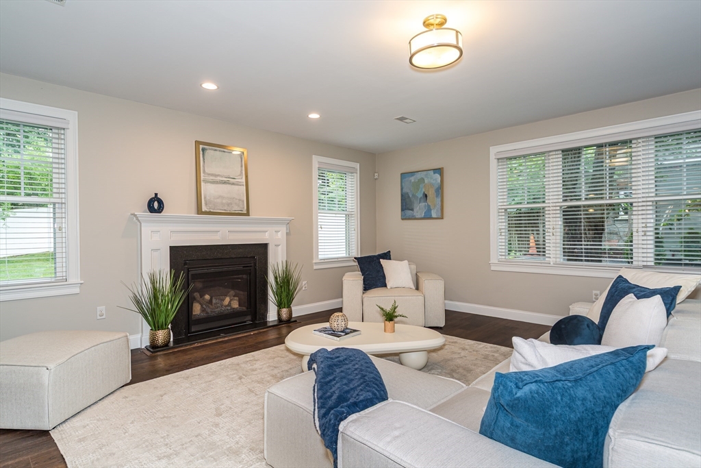 38 Westlake Road Natick, MA 01760 - Photo 7 of 36 a living room with furniture and a fireplace