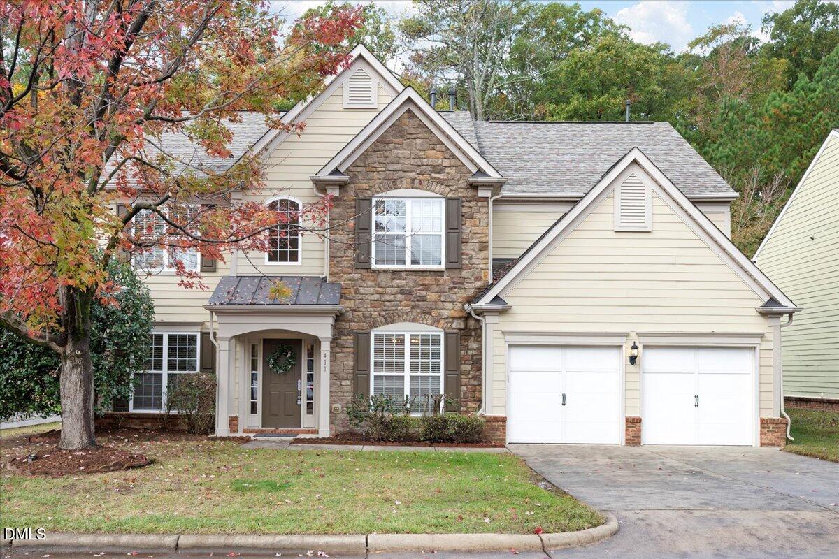 a view of house with yard and entertaining space
