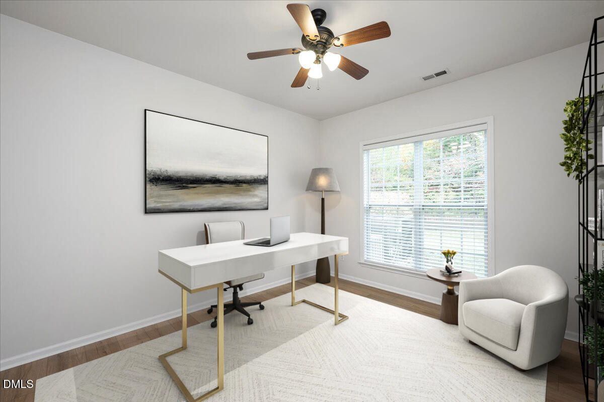 411 Amiable Loop Cary, NC 27519 - Photo 17 of 40 a living room with furniture and a window