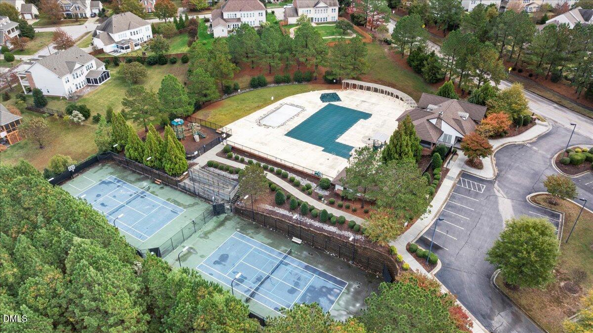 411 Amiable Loop Cary, NC 27519 - Photo 34 of 40 an aerial view of a house with a garden