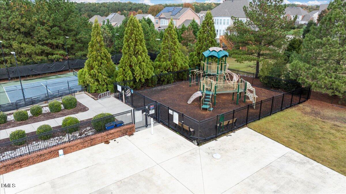 411 Amiable Loop Cary, NC 27519 - Photo 37 of 40 a view of a house with a yard
