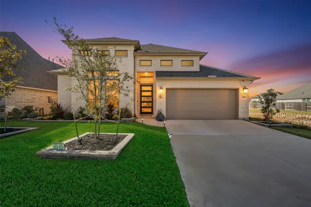 a view of a backyard with a garden and plants