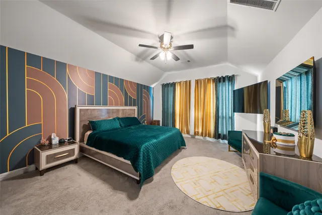 a living room with a bed furniture and a window