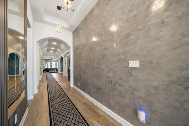 a view of a hallway view with staircase