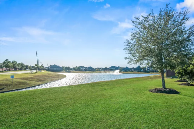 a front view of house with yard slide and outdoor seating