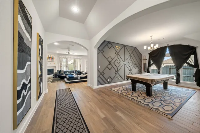 a lobby with furniture and a rug