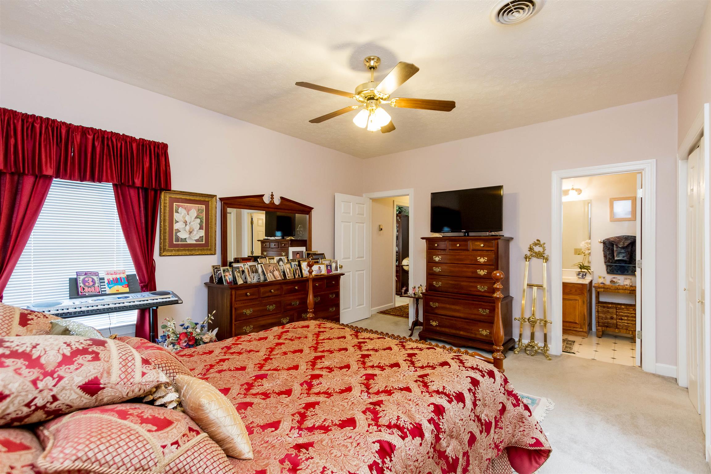 3611 Legacy Drive Springfield, TN 37172 - Photo 17 of 26 a bedroom with a bed and a flat screen tv